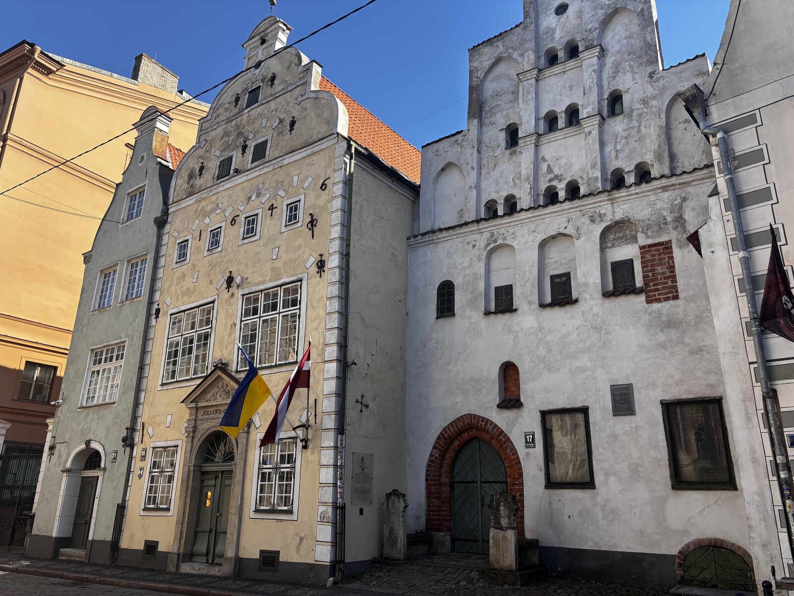 The Three Brothers houses on Mazā Pils iela 17, 19, 21 standing side by side in Riga Old Town, Latvia.